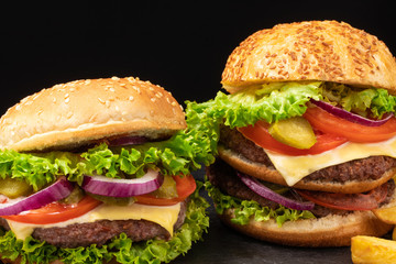 fresh tasty beef burger on dark background