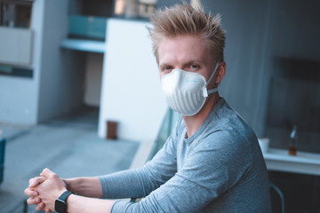 Man wearing FFP3 face mask respirator against flu 