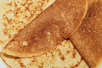 Thin pancakes close up texture background
