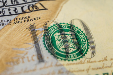 Element of American cash banknote 100 dollars. Macro photography