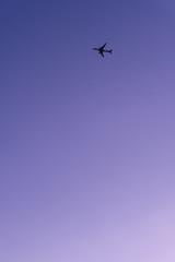 airplane in clear and minimalist sky
