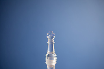 King chess piece on a blue trend background