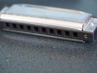 Closeup of C Harmonica with Bokeh