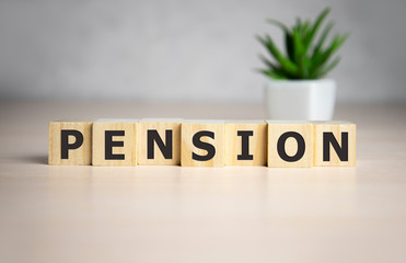 PENSION word on block concept, business concept.