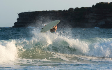 Fototapeta premium Surfer riding a large wave, SydneyAustralia