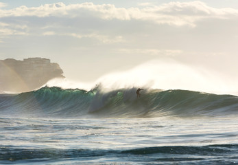 Surfer riding a large wave, SydneyAustralia