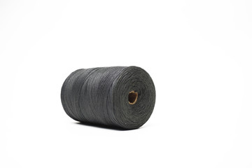 Large black coil of cotton thread isolate