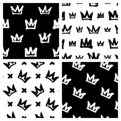 Set of 4 seamless patterns with ink brush painted crowns. Grunge graffiti street style vector wallpaper. Black and white backgrounds. 	