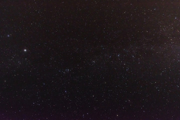 Naklejka premium Night sky with a lot of shiny colorful stars