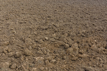 Background of the plowed field prepared for sowing