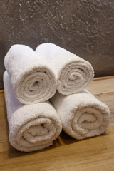 Towels twisted into a roll.