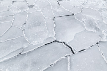 Close-up of cracked pieces of sea ice floating in Greenland