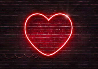 Neon sign on a brick wall in the shape of a heart.(illustration series)