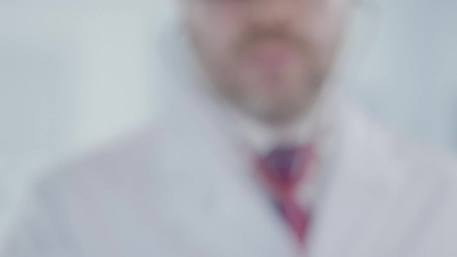 Doctor holds stethoscope bell with the Georgian flag. Healthcare in Georgia