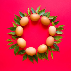 Easter wreath of eggs and green leaves, holiday attributes, faith symbol, square format concept,...
