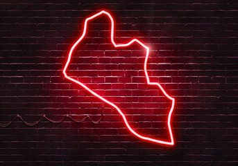 Neon sign on a brick wall in the shape of Liberia.(illustration series)