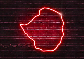 Neon sign on a brick wall in the shape of Zimbabwe.(illustration series)
