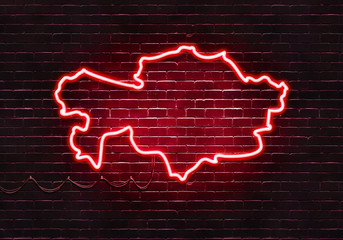 Neon sign on a brick wall in the shape of Kazakhstan.(illustration series)
