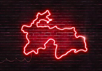 Neon sign on a brick wall in the shape of Tajikistan.(illustration series)