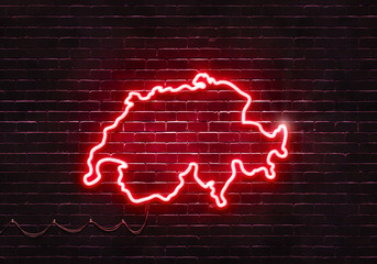 Neon sign on a brick wall in the shape of Switzerland.(illustration series)