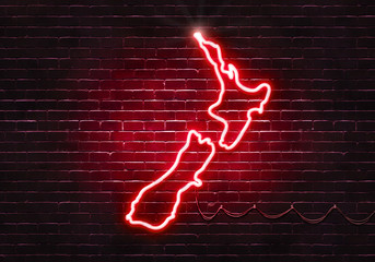 Neon sign on a brick wall in the shape of New Zealand.(illustration series)