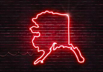 Neon sign on a brick wall in the shape of Alaska.(illustration series)