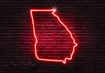 Neon sign on a brick wall in the shape of Georgia.(illustration series)