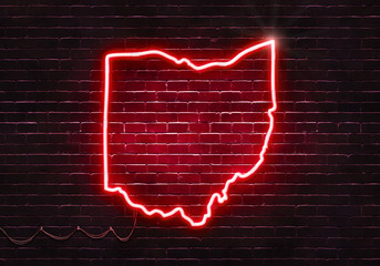 Neon sign on a brick wall in the shape of Ohio.(illustration series)