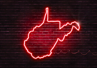 Neon sign on a brick wall in the shape of West Virginia.(illustration series)