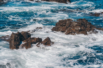 Naklejka premium Sea Wave and rock; natural background