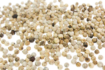 white peppers on the white background