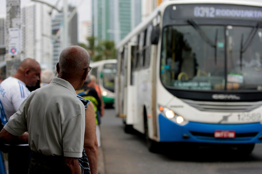 Senior Man Waiting For Bus In Salvador City