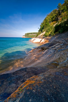 Afternoon sunlight on the turquoise waters of Lake Superior at Picture Rocks National Lakeshore.