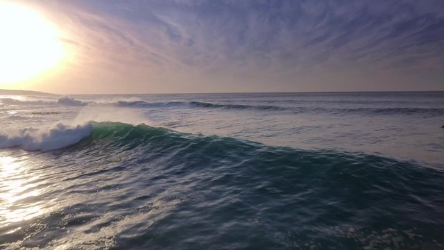 Flight to the meeting to the wave.Aerial view of crushing ocean waves, Foaming and Splashing in the Atlantic.Drone shot of waves 4K Canary Islands.	
