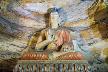 Buddha statue in Yungang stone cave. datong, Shanxi province, China. statue of buddha in temple