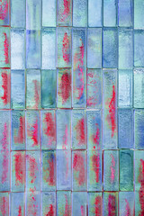 Red and blue glass blocks wall.