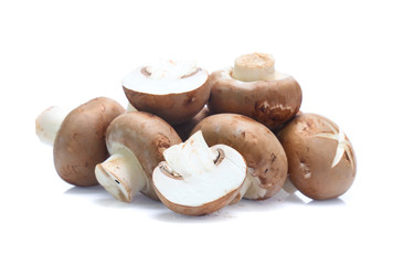 Fresh champignon mushrooms isolated on white