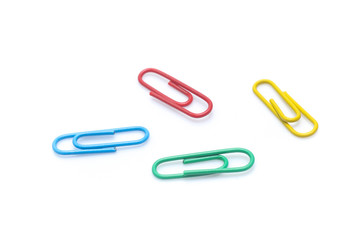color paperclips on a white background