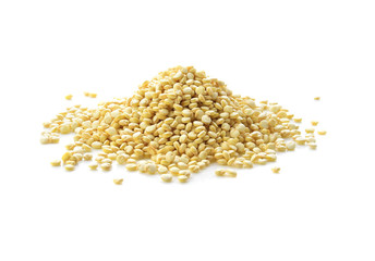 Heap of raw, uncooked quinoa seed on white background