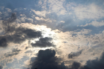 Dramatic and beautiful cloudscape with the sunlight and blue sky during the late afternoon