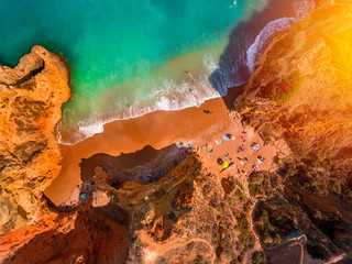 Aerial Drone View Of People  Relaxing On Algarve Beach, Portugal