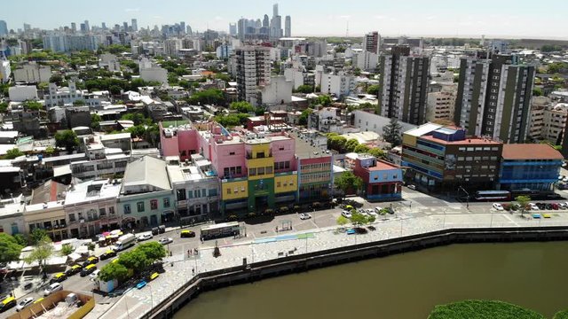 Aerial view of Benito Quinquela Mart&iacute;n museum, located in La Boca neighborhood in Buenos Aires. Drone flying over Matanzas river and slowly descending