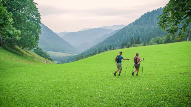 Adventurous couple trekking at Topla valley with excitement