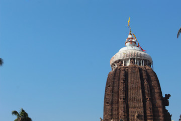 Sri jagannath temple puri south gate view closeup historical famous place with blue sky and trees in day light beautiful location wallpaper travel photography