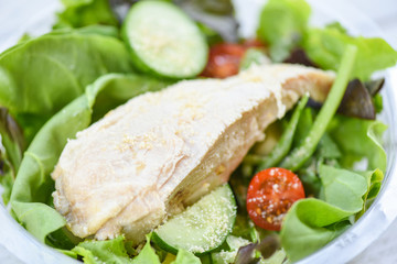 Salad vegetable and chicken - salad bowl and fresh lettuce tomato cucumber healthy food eating concept