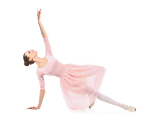 Beautiful young ballerina on white background