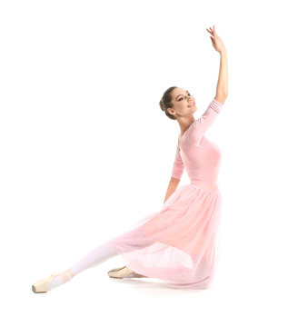 Fototapeta Beautiful young ballerina on white background