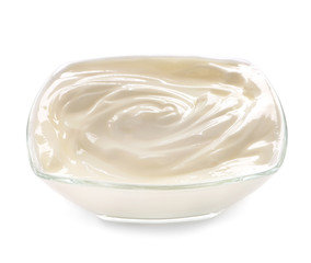 Bowl with tasty yogurt on white background
