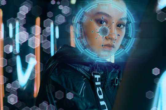 Asian woman looking at digital display. Corona virus concept