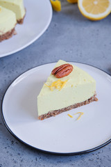 Homemade lemon raw vegan cake - healthy dessert made from coconut milk, butter, cashew, if-if